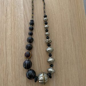 Elegant Beaded Necklace with Metallic Accents